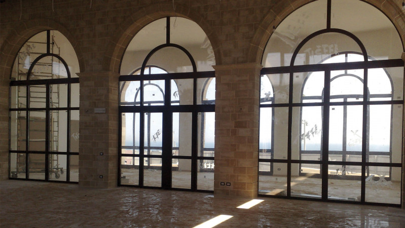 porte vetrate centinate EI60 in acciaio.jpg